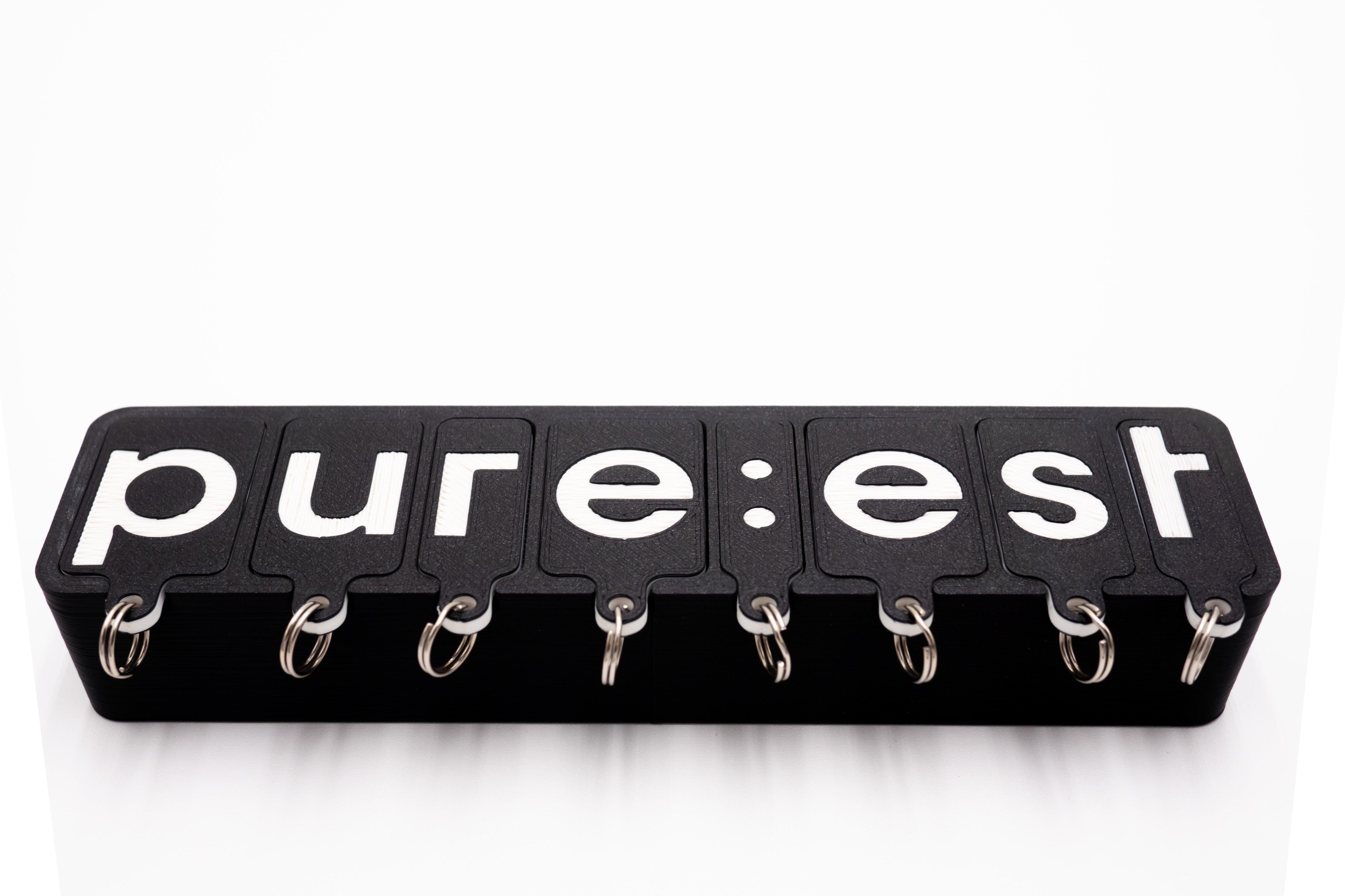 PURE : EST Porte-clés magnétique